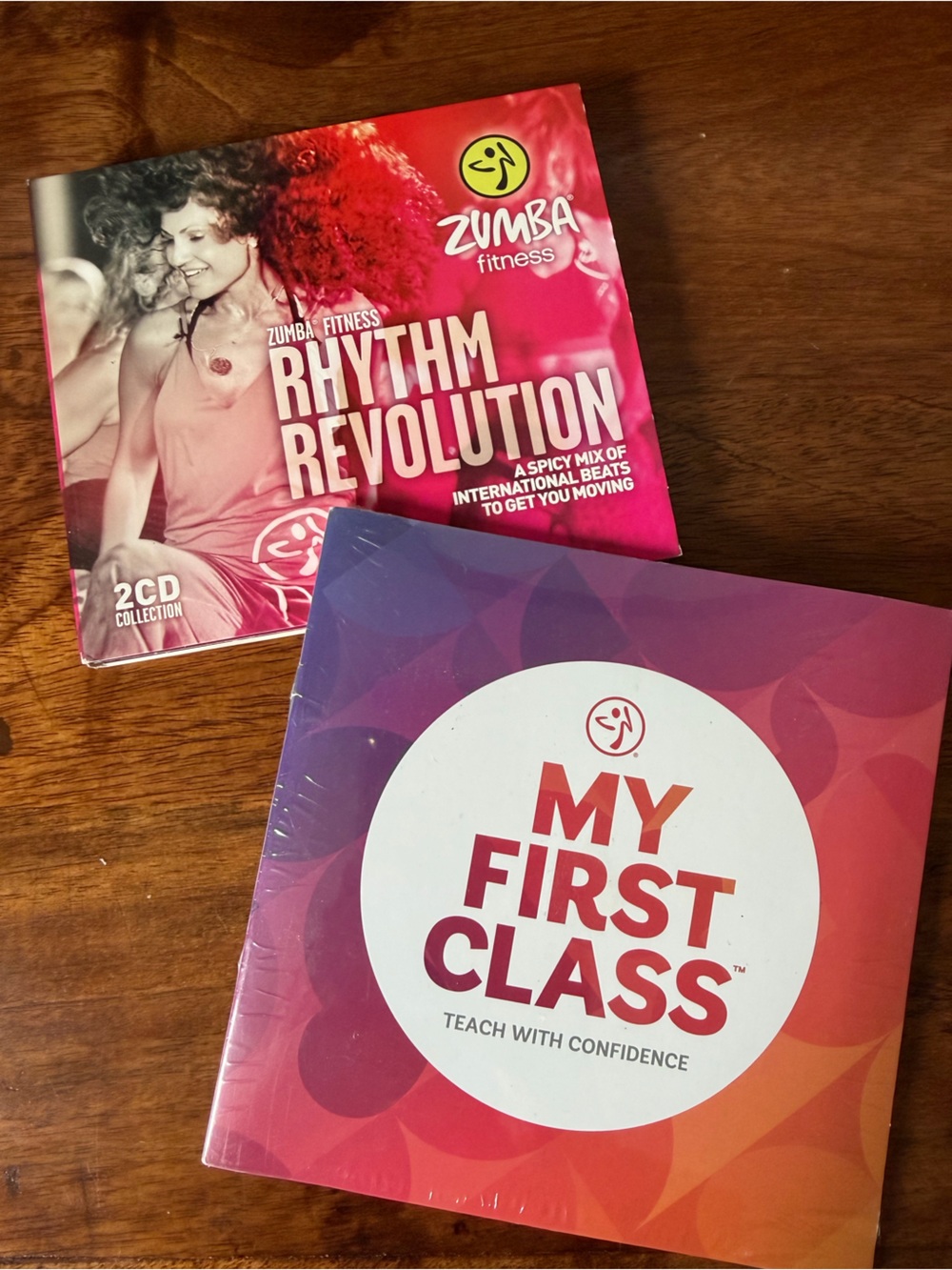 Zumba Fitness My First Class CD/ DVD SET and Rhythem Revolution CD set